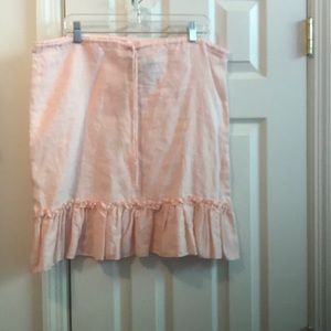 Baby pink linen skirt with ruffle bottom. Size L.
